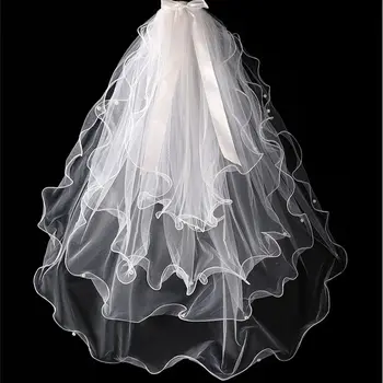 Свадебное платье из тюля с двойным бантом по этикету для новобрачных